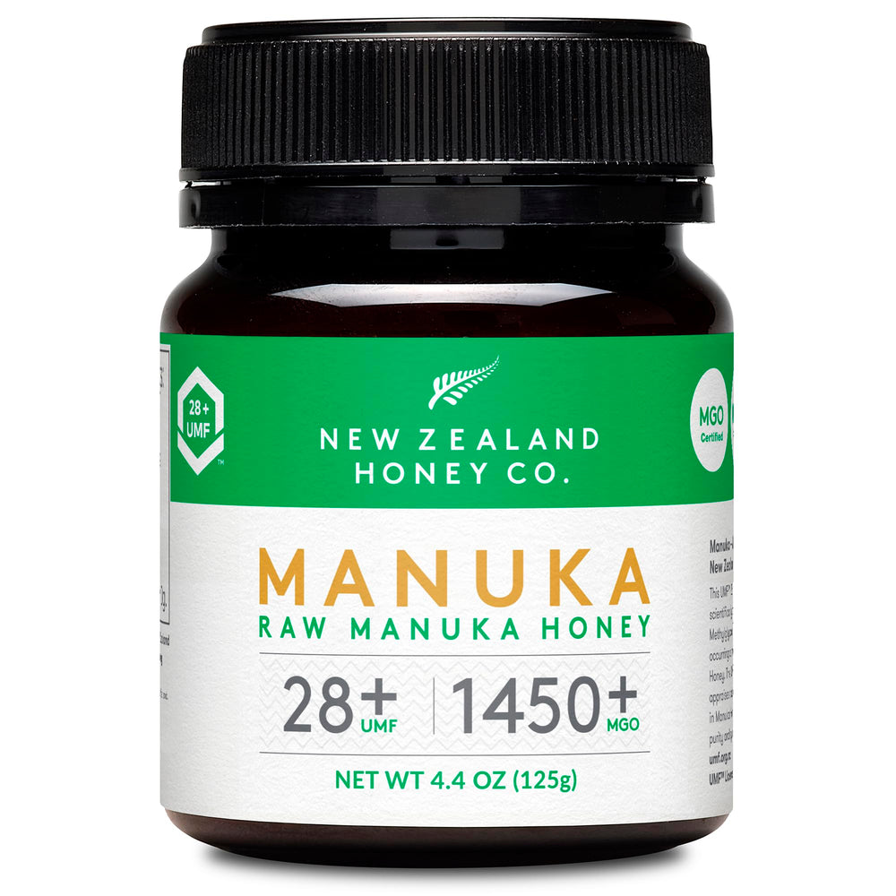 New Zealand Honey Co raw Manuka honey UMF 28+ bottle for daily use with rich amber hue.