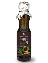 NICE WITCH'S raw perilla oil bottle showing clear golden oil for fresh salads
