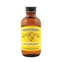 Pouring Nielsen-Massey lemon extract to boost citrus brightness in recipes