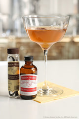 Nielsen-Massey Peppermint Extract on a kitchen scene suggests seasonal desserts