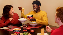 NISSIN Top Ramen HotPot Fusions Korean Spicy Beef family dining scene, ideal for sharing.