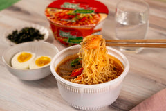 Microwavable Nongshim ramen bowl ready for quick prep