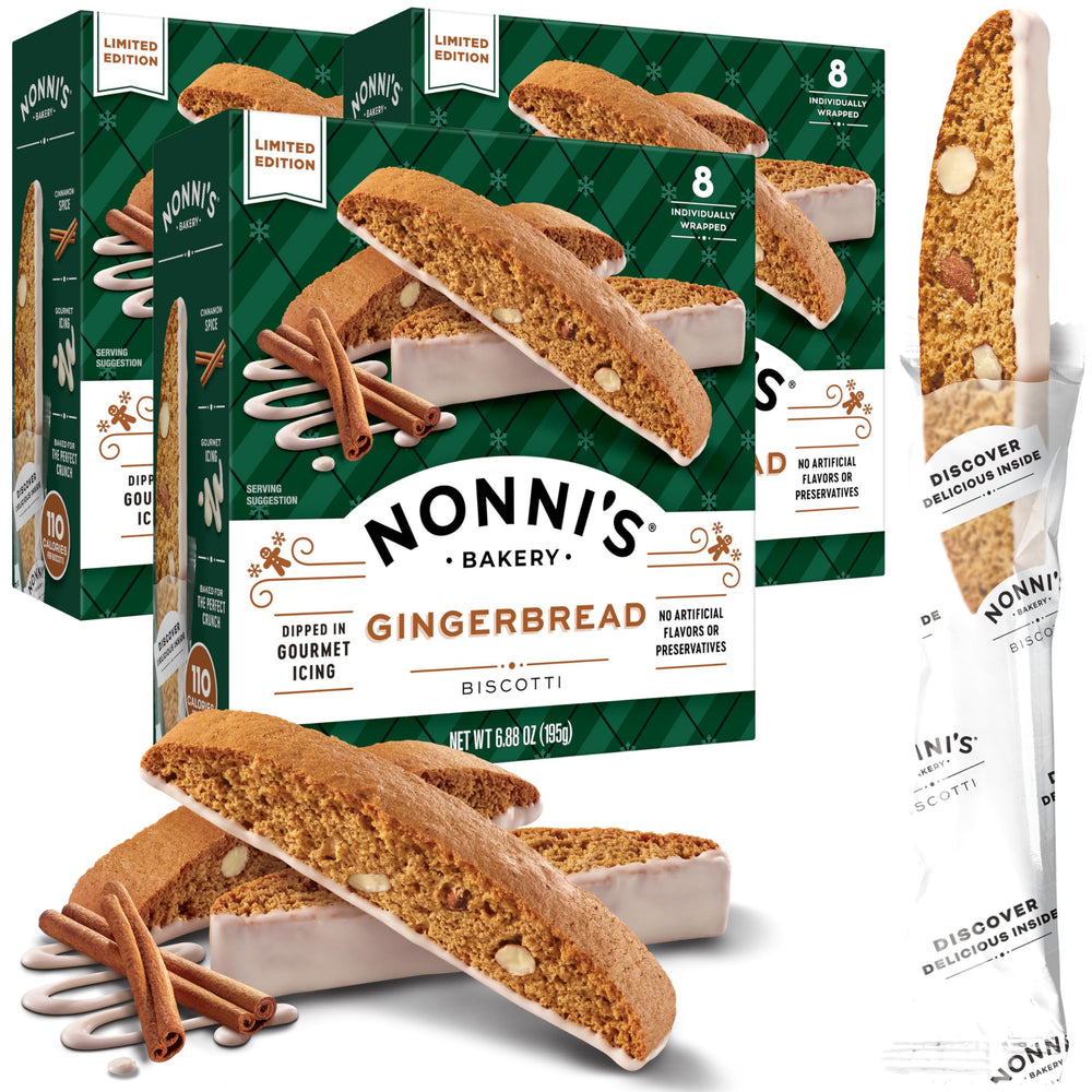 Nonni's Gingerbread Biscotti with almonds and white icing displayed on a platter for a festive snack.