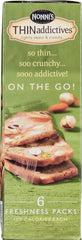 Close-up of almond pistachio bits in Nonni's THINaddictives cookie thins