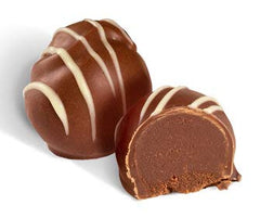 No Whey! Foods raspberry truffle highlighted, vibrant fruity center.