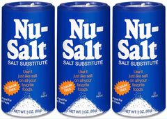 NU-SALT balance bottle pour demonstrates a sodium-free seasoning for everyday meals.