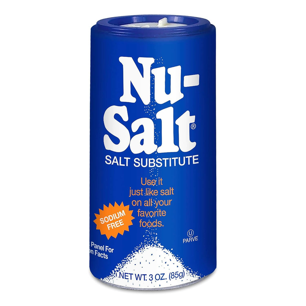 NU-SALT bottle pour demonstrates a sodium-free salt substitute for enhanced savory flavor.