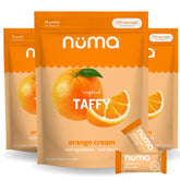 Numa Taffy Orange Cream wrapper close-up, showcasing real ingredients and natural flavor