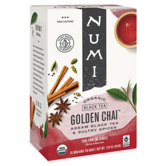Numi Golden Chai tea bags steeping in hot water for a rich cup