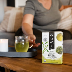 Numi Kukicha tea cup steaming with a mellow aroma and gentle finish