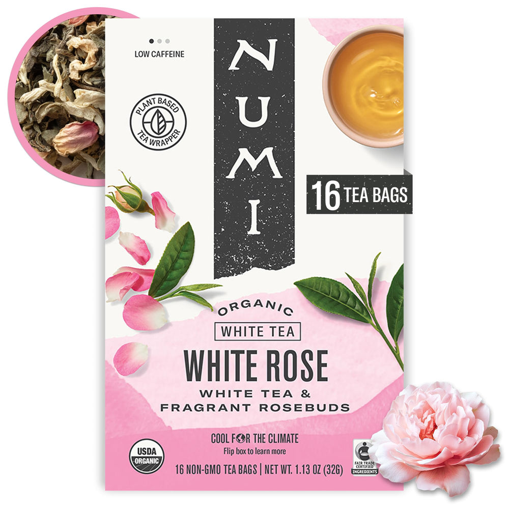 Numi White Rose Tea bag on a table with soft steam, gentle moment