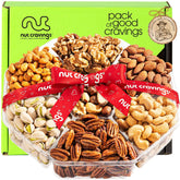 Nut Cravings Easter mixed nuts gift basket with red ribbon, ideal for gifting and sharing.