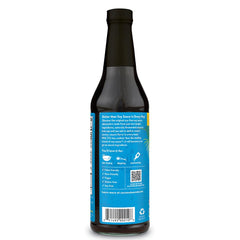 Pouring Nutiva Coconut Aminos over sushi for a savory finish