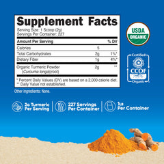 Nutricost turmeric powder on a measuring spoon, ready for smoothies and recipes.