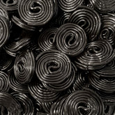 OBELYS Black Licorice Wheels 1lb bag: soft, chewy texture for easy sharing.