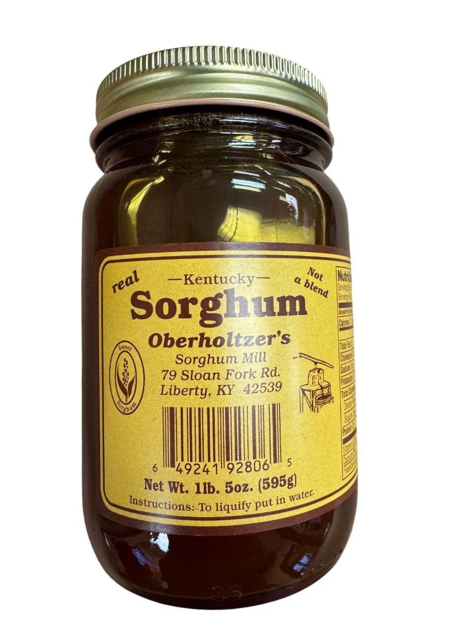 Oberholtzer's Pure Kentucky Sorghum bottle shows rich amber color for natural drizzle.