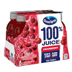 Pouring Ocean Spray cranberry juice into a glass for refreshing sip