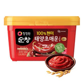 Ofood gochujang jar close-up highlights rich color for authentic Korean flavor base.