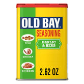 Old Bay Garlic & Herb Seasoning jar on shelf, ideal for seafood and vegetables.