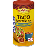 Old El Paso taco seasoning bottle pouring flavor into sizzling fillings.