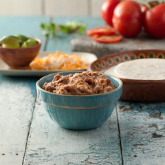 Old El Paso Traditional Refried Beans microwave-ready, ideal for fast weeknight dinners.