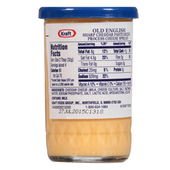 Old English Cheese Spread being scooped from the jar for easy spreading