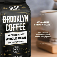 Olde Brooklyn Coffee French Dark Roast close-up emphasizes smoky notes and chocolate.
