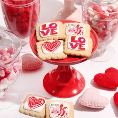 OMCookie valentines cookies vanilla frosting closeup reveals edible ink details.