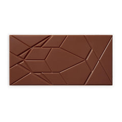 Close-up of Omnom Coffee + Milk texture shows smooth melt and hazelnut hints.