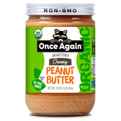 Once Again Organic Creamy Peanut Butter jar on counter, smooth unsweetened spread