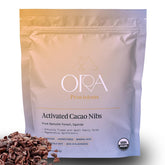 Ora Pure Ceremonial Cacao Nibs in a 4oz bag, ideal for snacking or toppings.