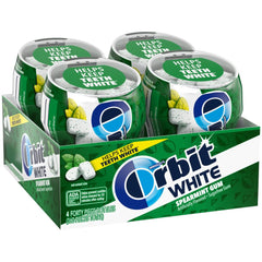Orbit White Spearmint gum bottle on a desk for long-lasting fresh breath.