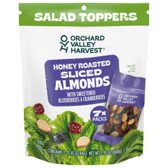 Orchard Valley Harvest Salad Toppers with almonds blueberries and cranberries on a fresh salad