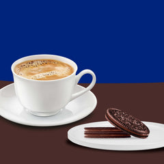 OREO Thins dunking in milk for snacktime.