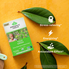 Organic India Tulsi Green Tea Cup with steam illustrating mild caffeine boost.