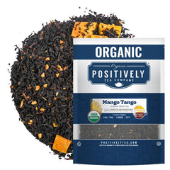 Organic Positively Mango Tango tea leaves closeup, ideal for a bright citrus-forward brew.