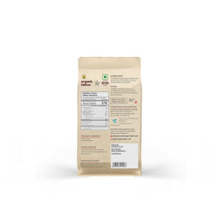 Organic Tattva Jowar Flour pouring into a bowl for quick gluten-free batter