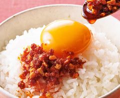 OSK S&B chili oil with crunchy garlic topping adding texture to noodles