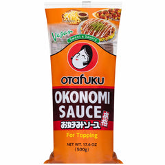 Otafuku Okonomi sauce bottle on a kitchen counter, ready to flavor Osaka style pancakes.