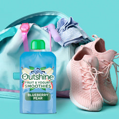 Outshine blueberry pear smoothie pouch pour reveals creamy texture for on-the-go enjoyment