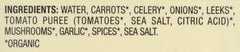 Pacific Foods organic vegetable broth label highlighting gluten-free and vegan base.