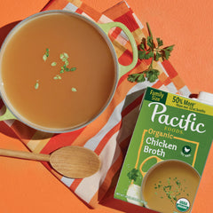 Pacific Foods Organic Chicken Broth being poured into a pan for gravies and sauces.