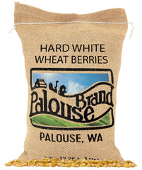 Palouse Brand glyphosate-free hard white wheat berries in a bag for pantry storage.