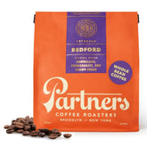 PARTNERS COFFEE ROASTERS Bedford espresso beans ready for grinding for a rich home espresso.