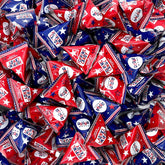 PartyWorks Patriotic Candy bag of red, white, and blue triangles for Fourth of July parties.