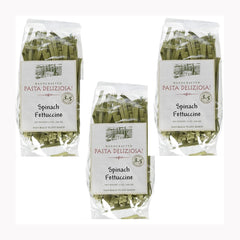 Pasta Deliziosa spinach fettuccine 3-pack with vibrant green ribbons, ready for dinner.
