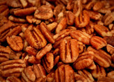 Pecan Shop unsprayed sprouted pecans in wooden bowl for snacking.