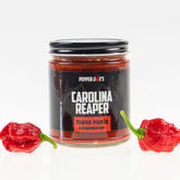 Pepper Joe's Carolina Reaper Mash jar front label highlights intense heat for bold dishes.