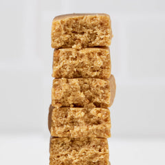 Close-up of the cookie-dough texture in a Perfect Bar Mini.
