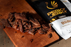 Perky Jerky Hot & Bothered marination with peppers and garlic for bold flavor.